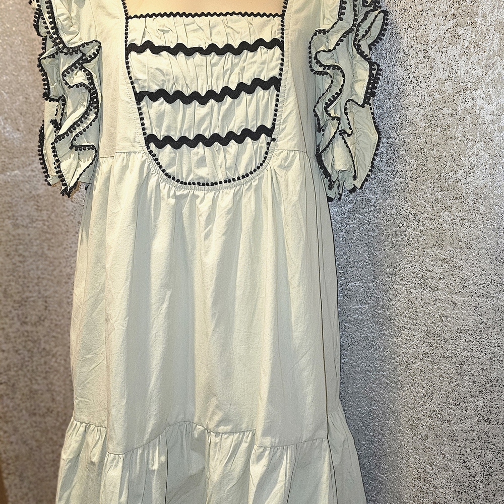 Ruffled Pistachio Green Dress with Black Trim